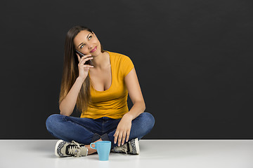 Image showing Woman talking at phone