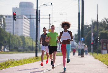 Image showing multiethnic group of people on the jogging