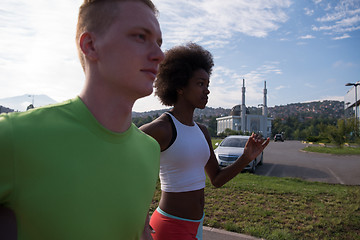 Image showing multiethnic group of people on the jogging