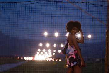 Image showing portrait of a young African-American woman in a summer dress