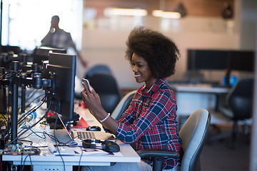 Image showing portrait of a young successful African-American woman in modern 