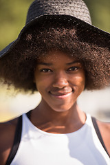 Image showing Close up portrait of a beautiful young african american woman sm