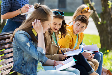 Image showing group of students with notebooks at school yard