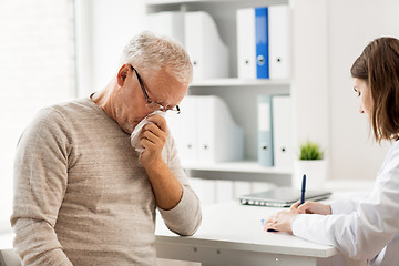 Image showing senior man and doctor meeting at hospital