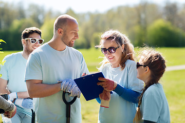 Image showing group of volunteers planting trees in park