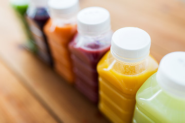 Image showing bottles with different fruit or vegetable juices