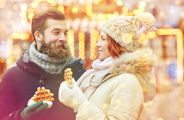 Image showing happy couple walking in old town