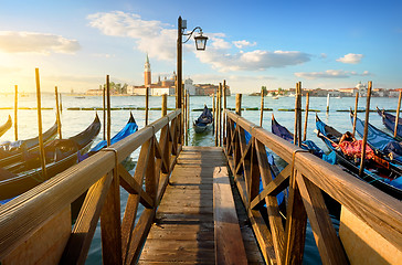 Image showing Gondolas and pier