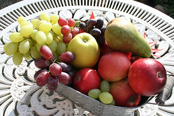 Image showing Apples, pears and grapes in basket
