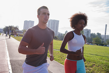 Image showing multiethnic group of people on the jogging