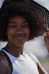 Image showing Close up portrait of a beautiful young african american woman sm