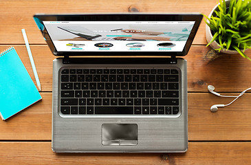 Image showing close up of laptop computer with internet shop