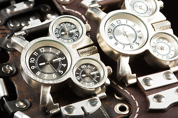 Image showing unusual watches. several alternatives dials