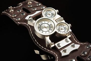 Image showing unusual watches. several alternatives dials