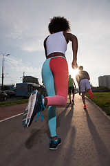 Image showing multiethnic group of people on the jogging