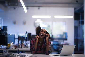 Image showing portrait of a young successful African-American woman in modern 