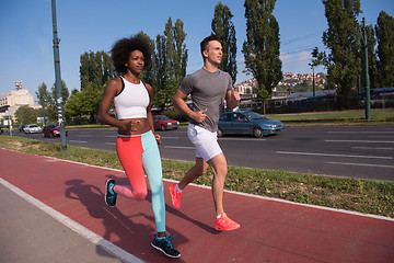 Image showing multiethnic group of people on the jogging