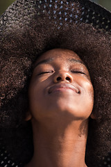 Image showing Close up portrait of a beautiful young african american woman sm