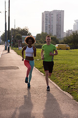 Image showing multiethnic group of people on the jogging