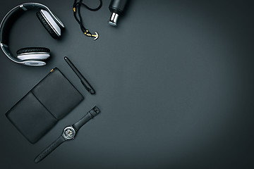 Image showing Still life of casual man. Modern male accessories on black