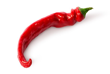 Image showing Single curved chili peppers on the side