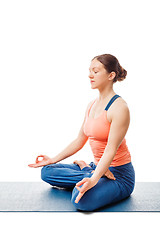 Image showing Woman meditating in yoga asana Padmasana Lotus pose