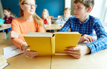 Image showing high school students reading book and learning