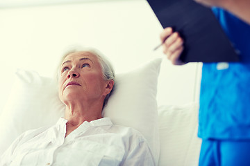 Image showing nurse and senior woman patient at hospital