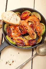 Image showing roasted shrimps with zucchini and tomatoes