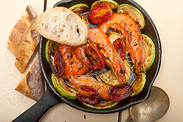 Image showing roasted shrimps with zucchini and tomatoes