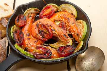 Image showing roasted shrimps with zucchini and tomatoes