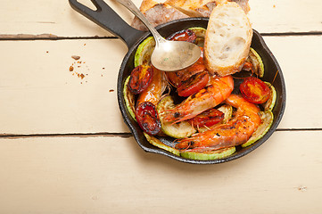 Image showing roasted shrimps with zucchini and tomatoes