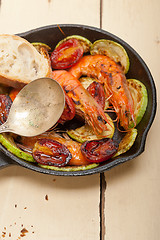 Image showing roasted shrimps with zucchini and tomatoes