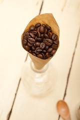 Image showing espresso coffee beans on a paper cone