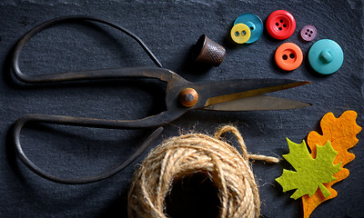 Image showing vintage scissors with a roll of twine 