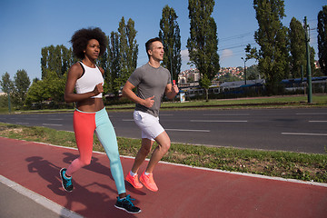 Image showing multiethnic group of people on the jogging