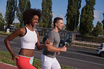 Image showing multiethnic group of people on the jogging