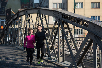 Image showing young  couple jogging