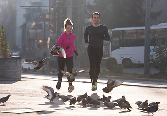 Image showing young  couple jogging