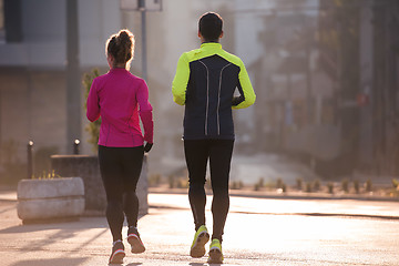 Image showing young  couple jogging