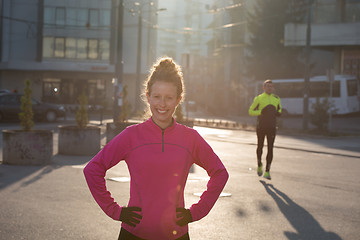 Image showing woman  stretching before morning jogging