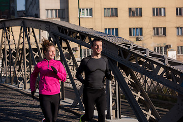 Image showing young  couple jogging