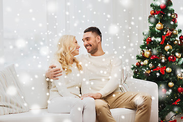 Image showing happy couple at home with christmas tree