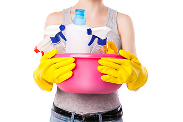 Image showing Unknown female holding cleaning substance.