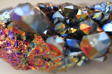 Image showing crystal with metal rainbow surface