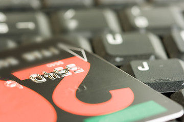 Image showing business online shopping credit card on a keyboard