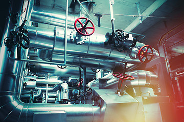 Image showing different size and shaped pipes and valves at a power plant 