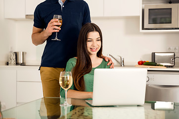 Image showing Young couple on the kitchen