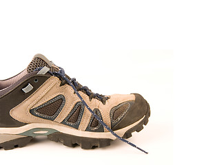 Image showing clothes hiking boots or shoes isolated on a withe background made of leather and waterproof and breathable membrane