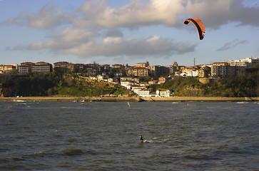 Image showing beach sport water kite surf. a man practicing kite surfing in the beach